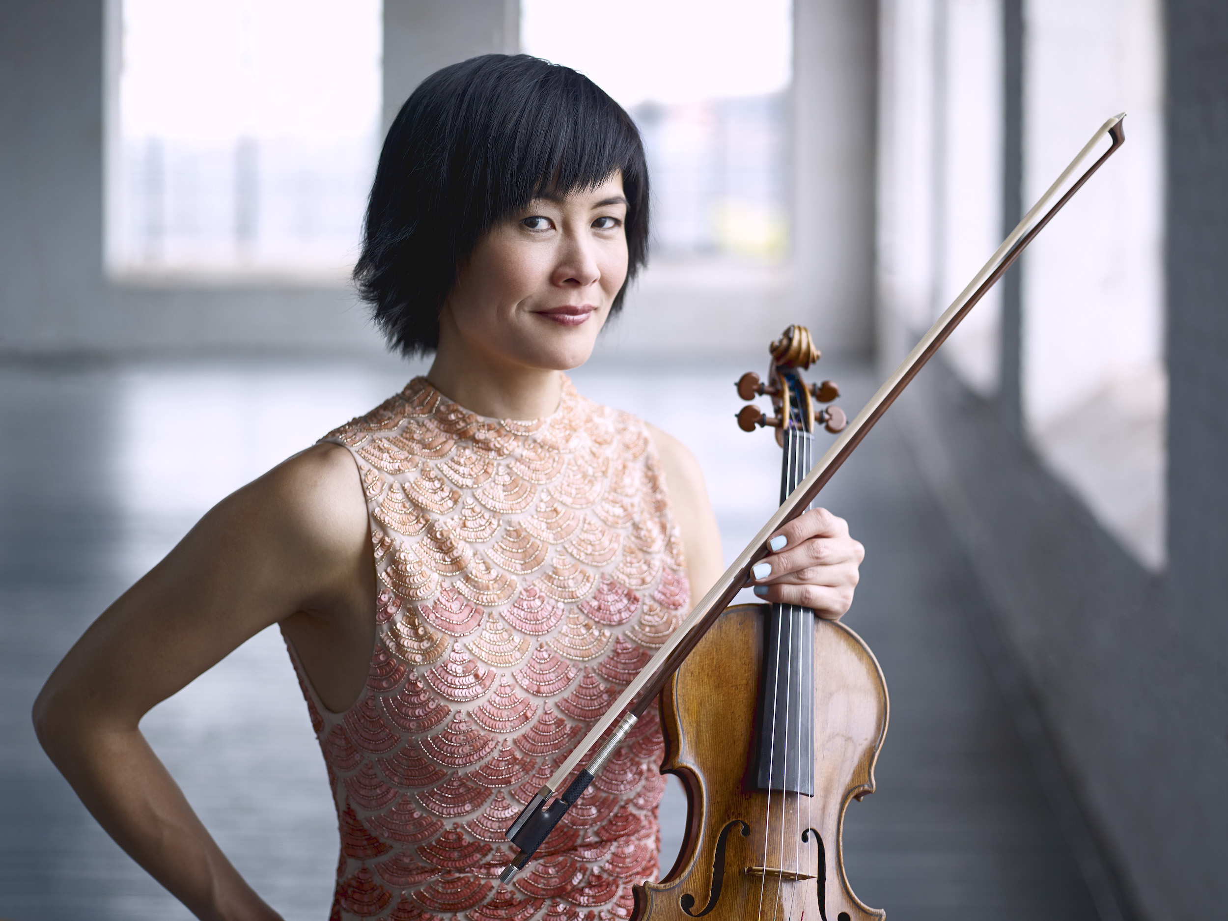 Headshot of Jennifer Koh holding violin