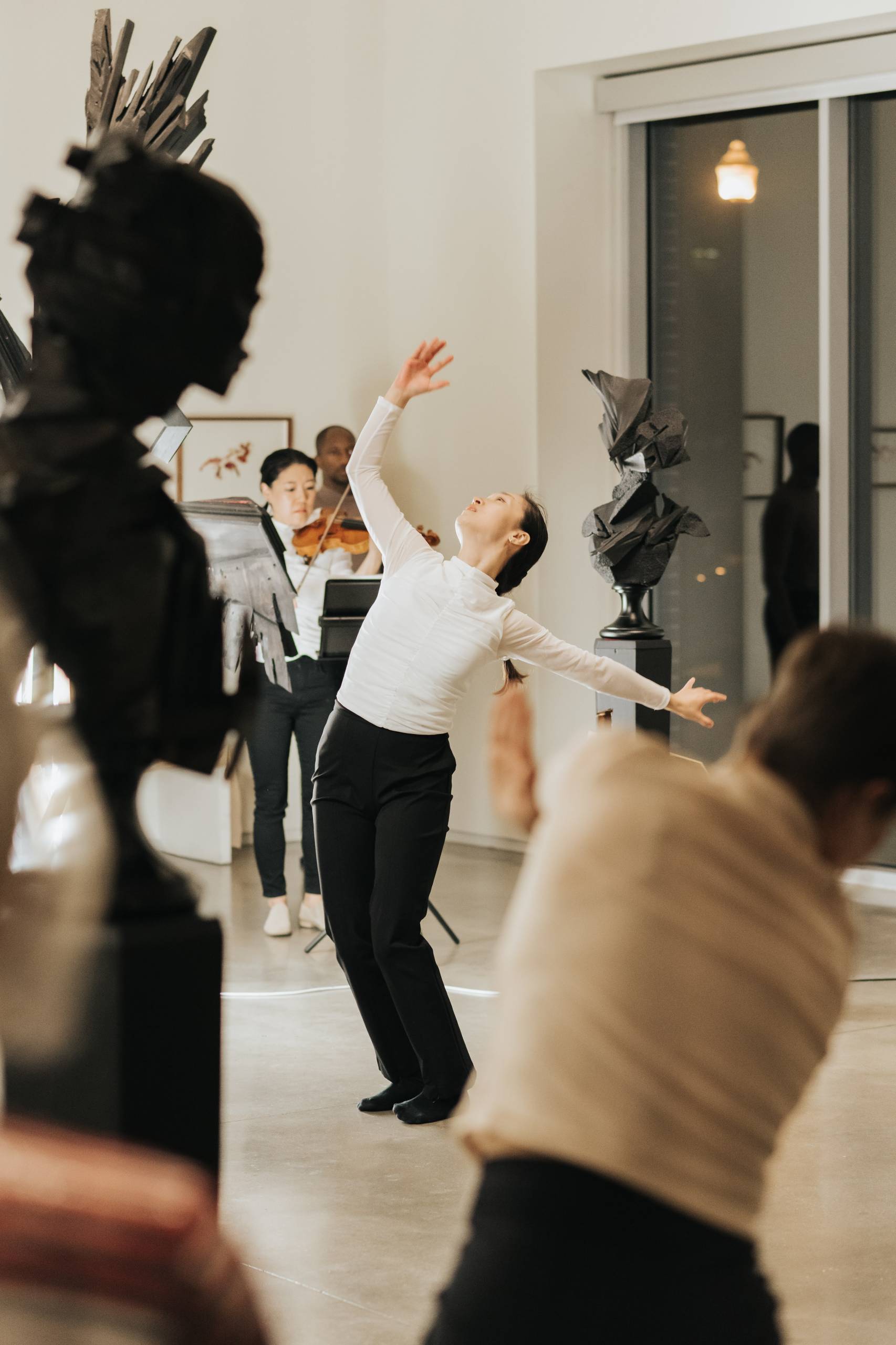 Members of performance ensemble Flyover Dance Collective perform in the 21c Hotel and Museum galleries.
