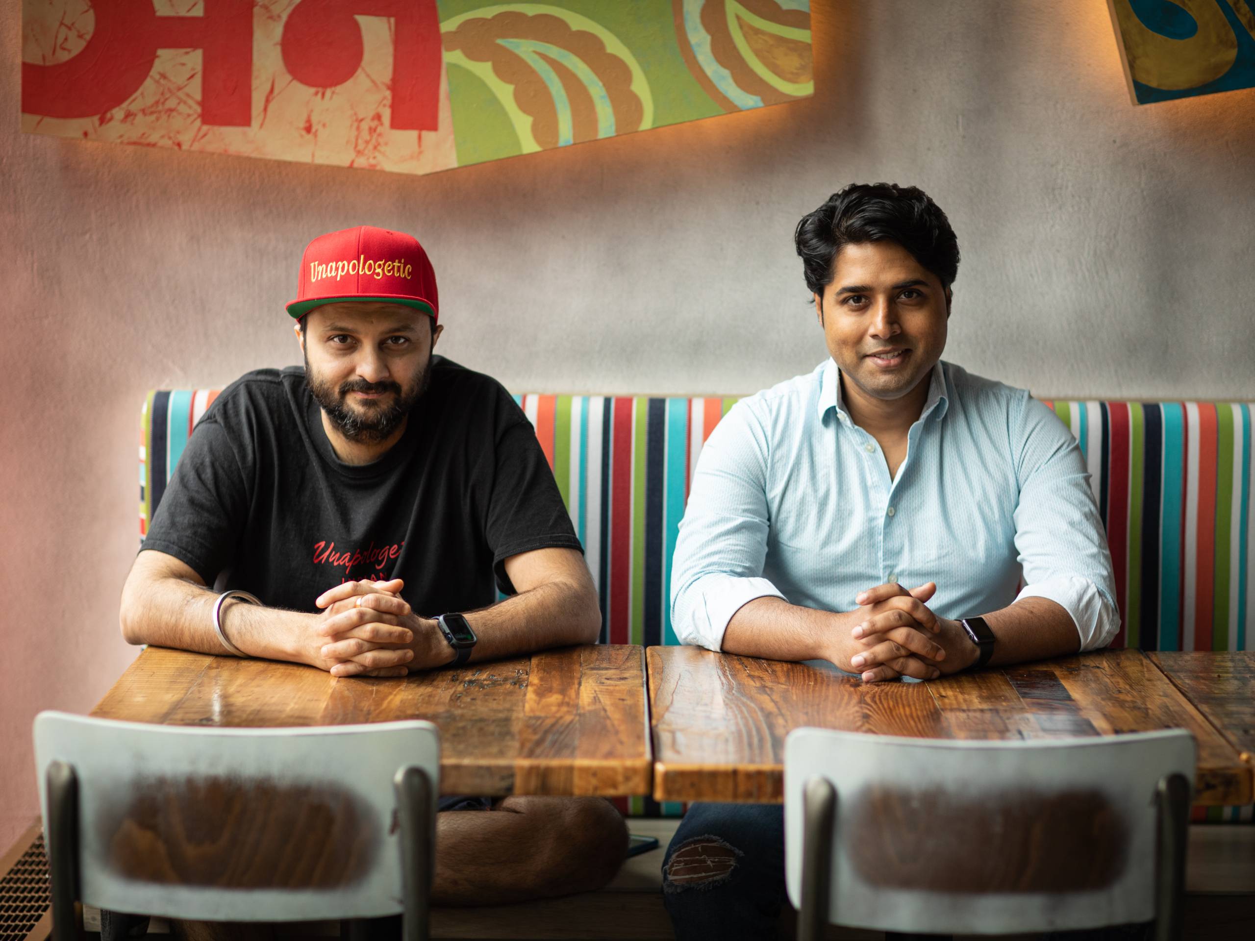 Chef and Partner Chintan Pandya and restaurateur Roni Mazumdar in the dining room at Dhamaka at Essex Street Market on the Lower East Side.