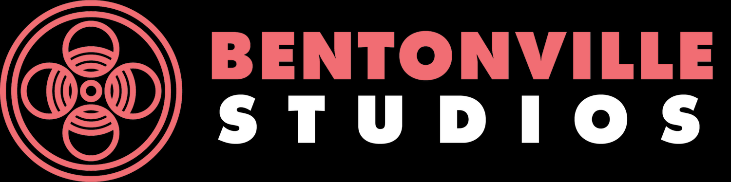 Bentonville Studios logo with pink and white text, stylized emblem on black background.